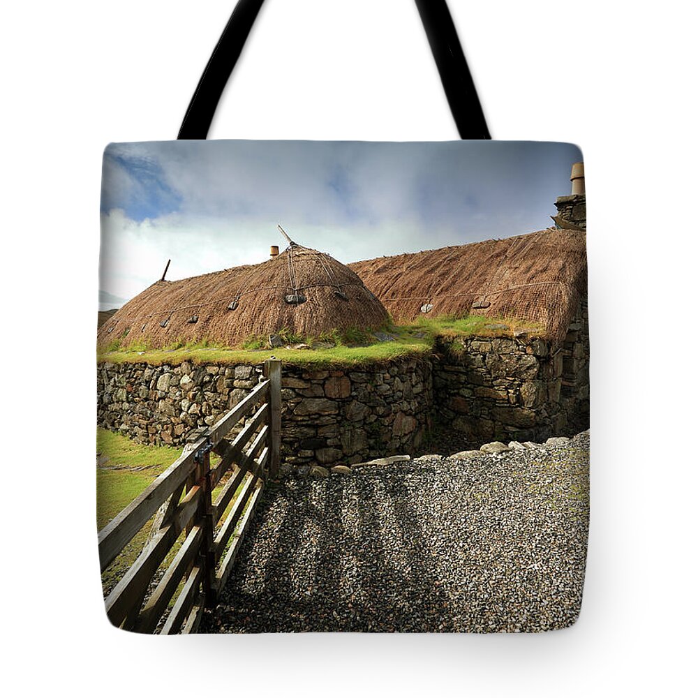 Blackhouse Tote Bag featuring the photograph Thatched Blackhouse, Isle of Lewis by Maria Gaellman