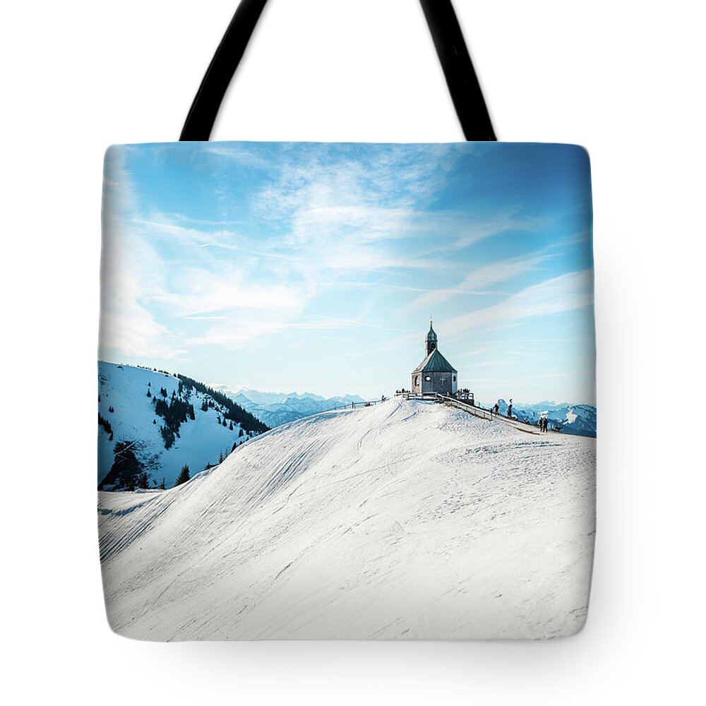 Wallberg Tote Bag featuring the photograph The chapel in the alps by Hannes Cmarits