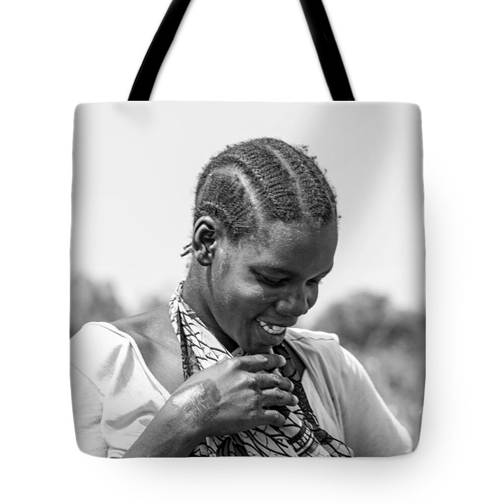Person Tote Bag featuring the photograph The shy one #1 by Pravine Chester