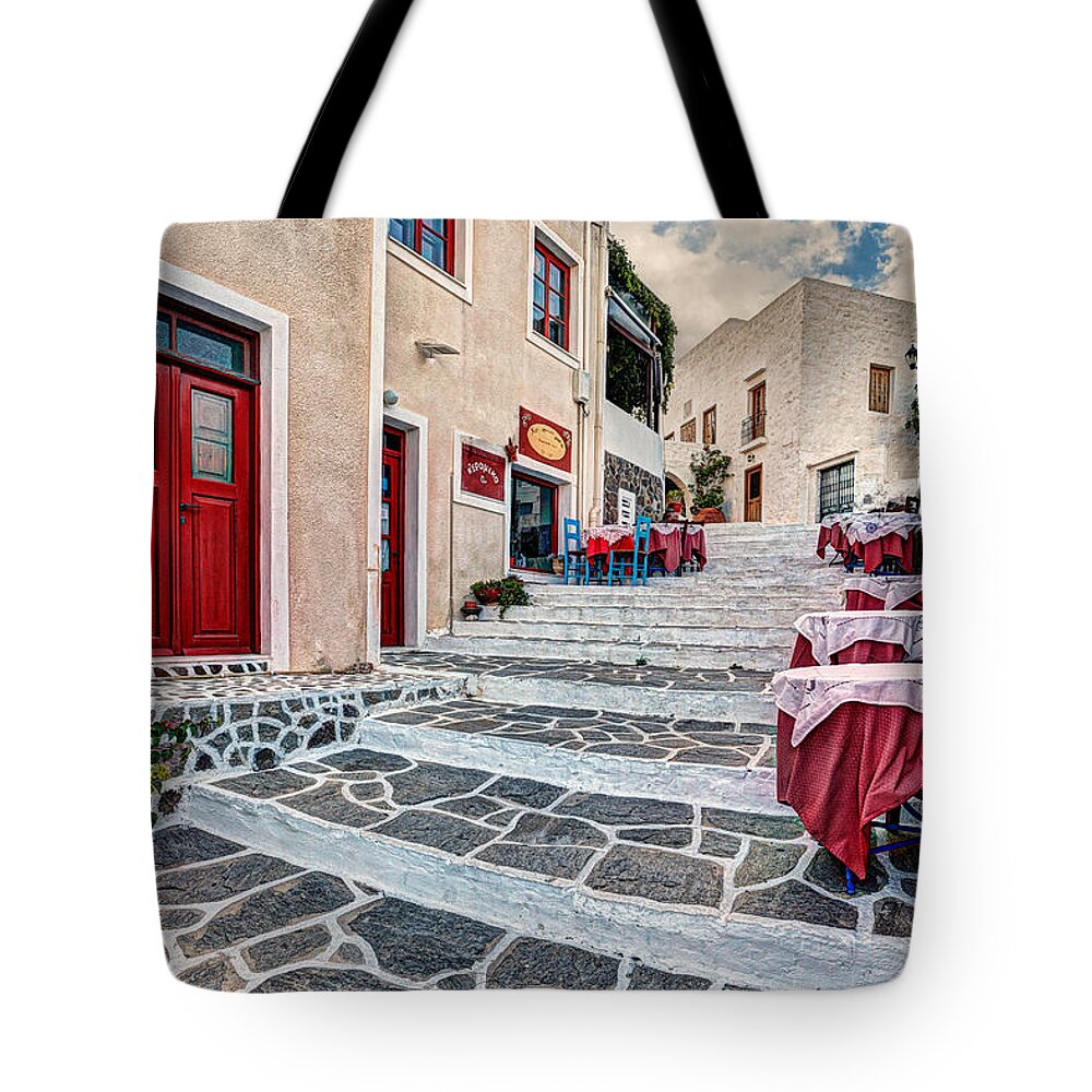 Milos Tote Bag featuring the photograph The village of Plaka in Milos - Greece #1 by Constantinos Iliopoulos