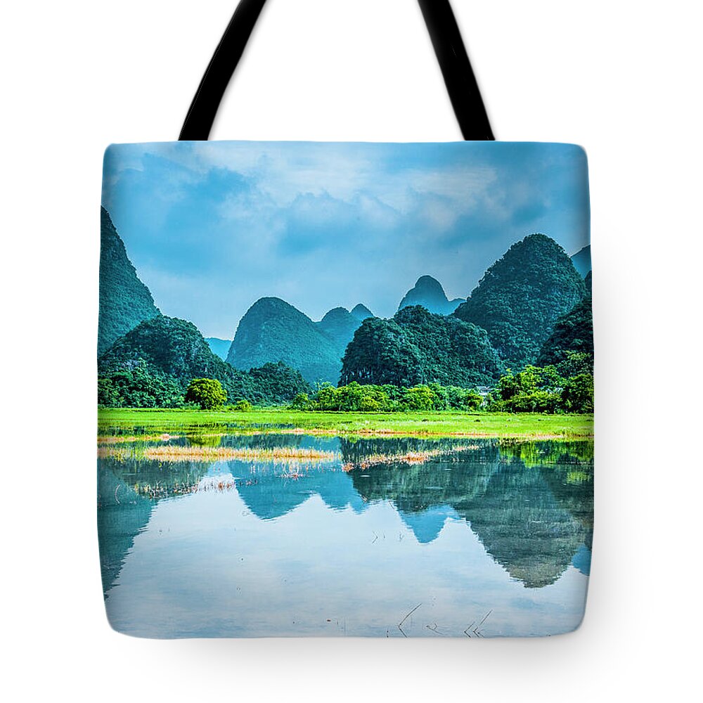 Karst Tote Bag featuring the photograph Karst rural scenery in raining #126 by Carl Ning