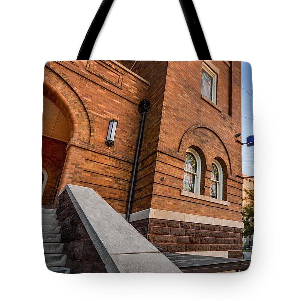 Birmingham Tote Bag featuring the photograph 16th Street Baptist Church Sign and Steps in Birmingham Alabama by Michael Thomas