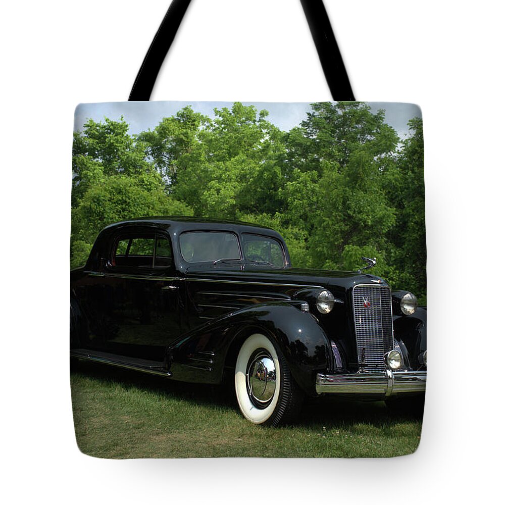 1937 Tote Bag featuring the photograph 1937 Cadillac V16 Fleetwood Stationary Coupe by Tim McCullough