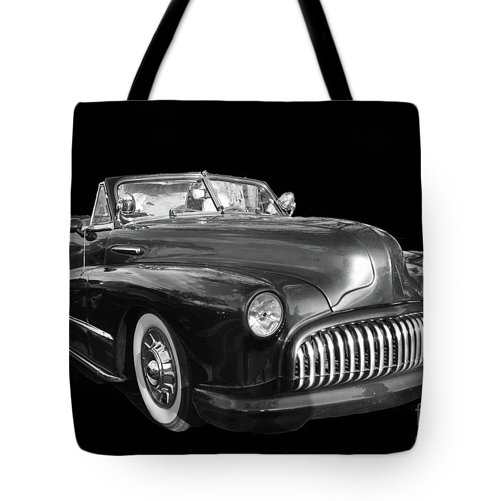 1948 Buick Convertible Tote Bag featuring the photograph 1948 Buick Convertible black and white by Christine Dekkers