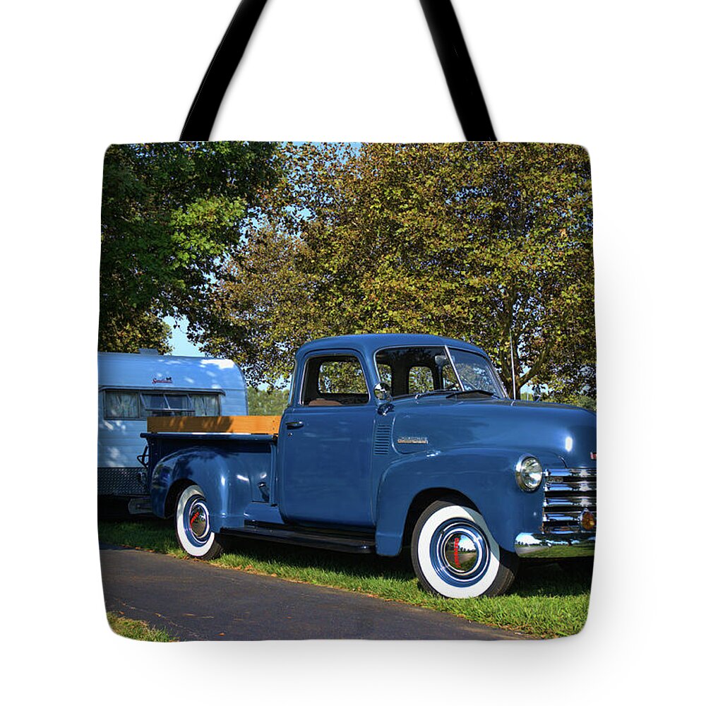 1950 Tote Bag featuring the photograph 1950 Chevrolet Pickup Truck with Camper Trailer by Tim McCullough