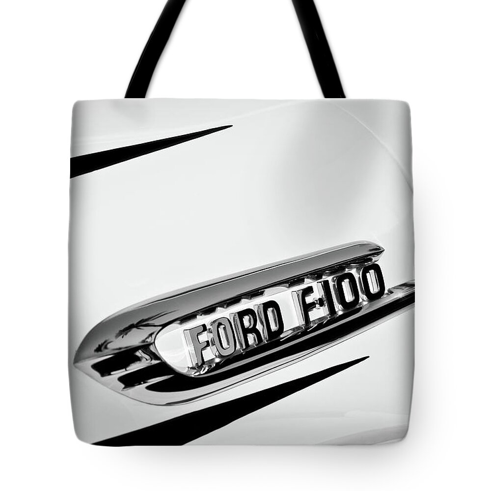 1950's Ford F-100 Fordomatic Pickup Truck Emblem Tote Bag featuring the photograph 1950's Ford F-100 Fordomatic Pickup Truck Emblem -0129bw by Jill Reger