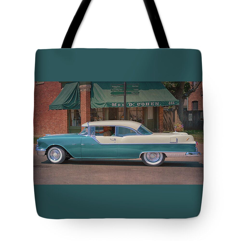 Pontiac Tote Bag featuring the photograph 1955 Pontiac Star Chief by Susan Rissi Tregoning