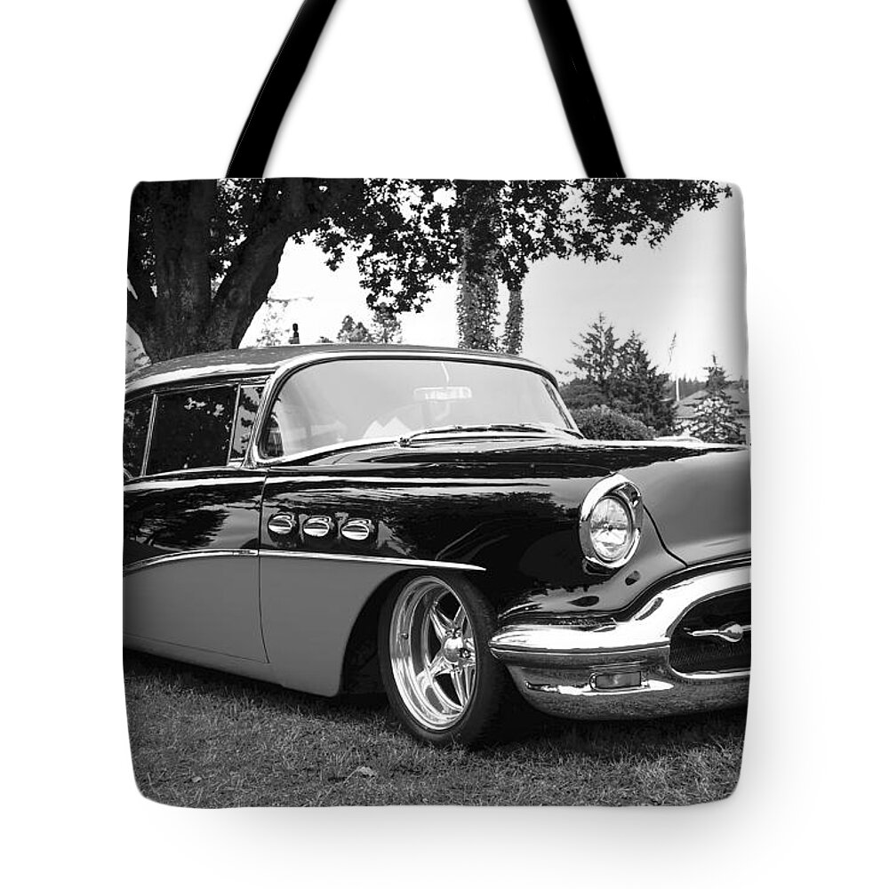 1956 Buick Riviera Tote Bag featuring the photograph 1956 Buick Riviera B and W by Ronda Broatch