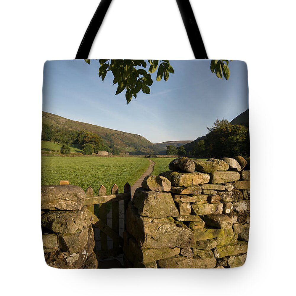 Muker Meadows Tote Bag featuring the photograph Muker Meadows by Smart Aviation