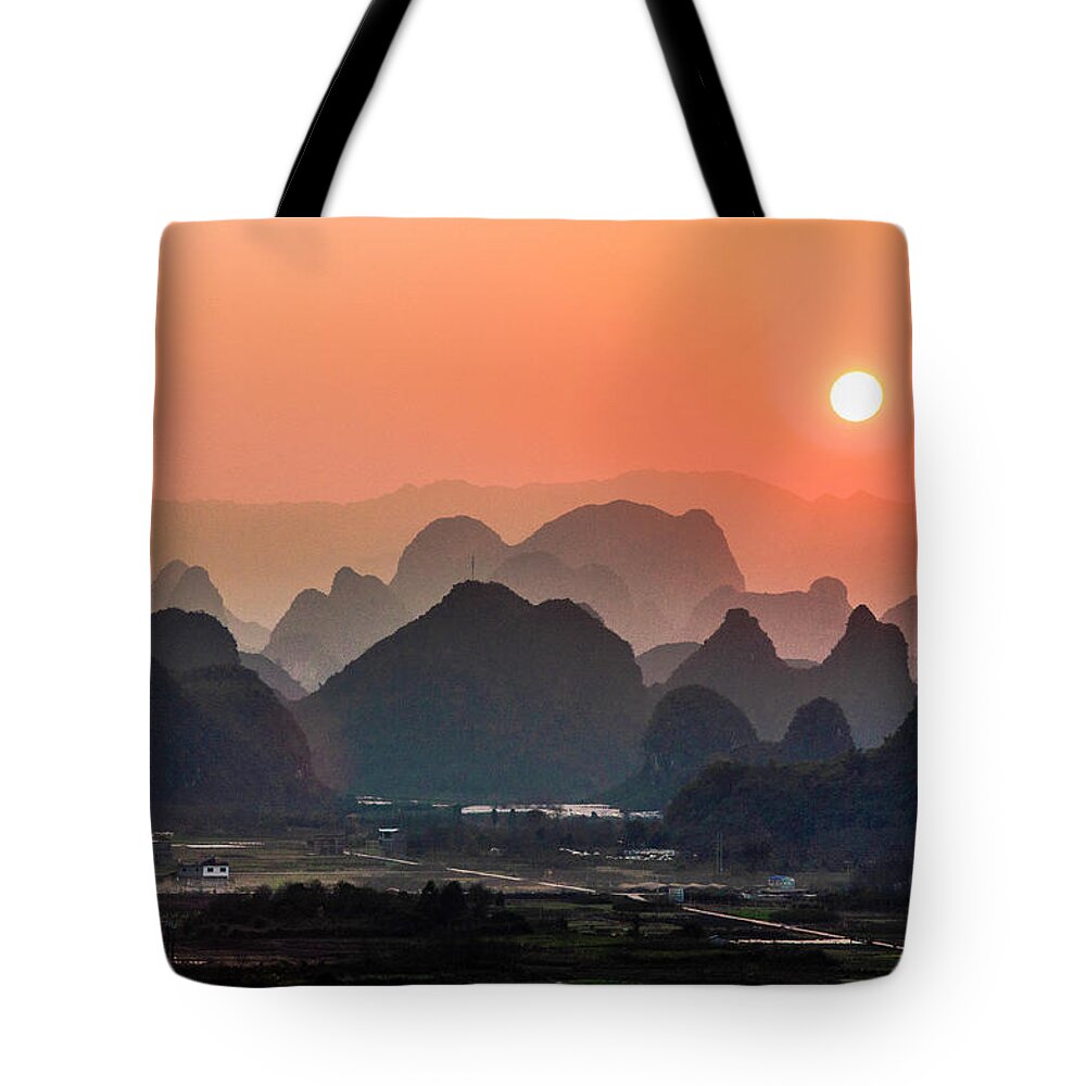 Karst Tote Bag featuring the photograph Karst mountains scenery in sunset #20 by Carl Ning