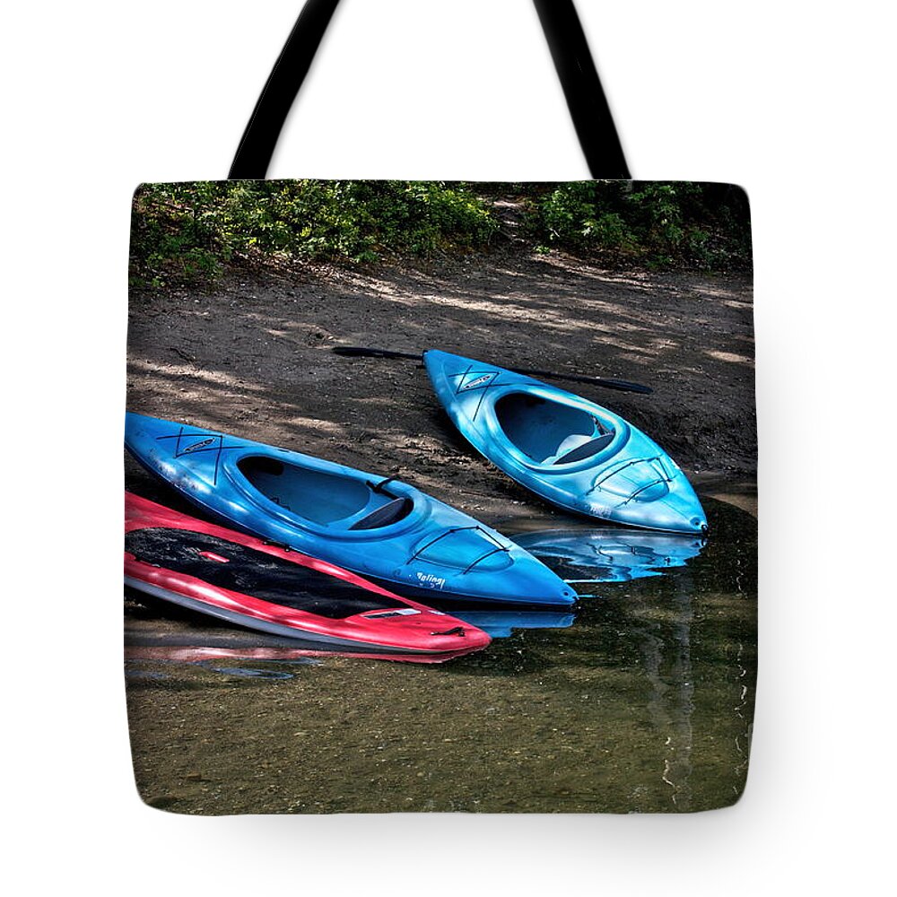 Kayaks Tote Bag featuring the photograph 3 Kayaks by Linda Bianic