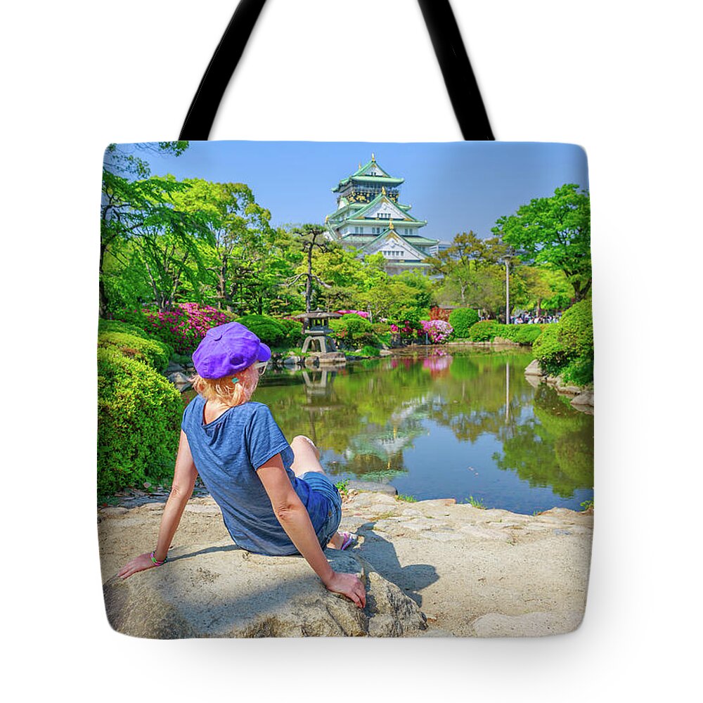 Osaka Castle Tote Bag featuring the photograph Tourist at Osaka Castle #3 by Benny Marty