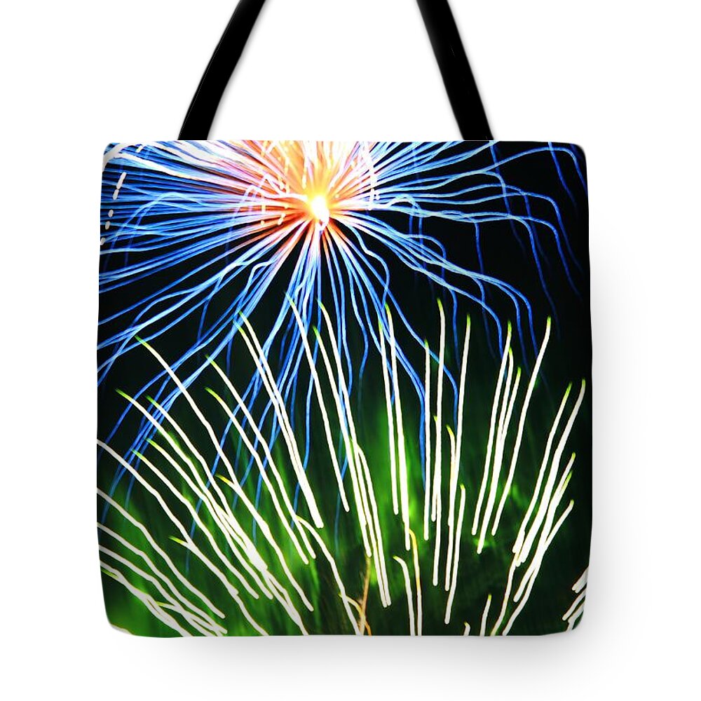 Firework Tote Bag featuring the photograph Fireworks by Donn Ingemie