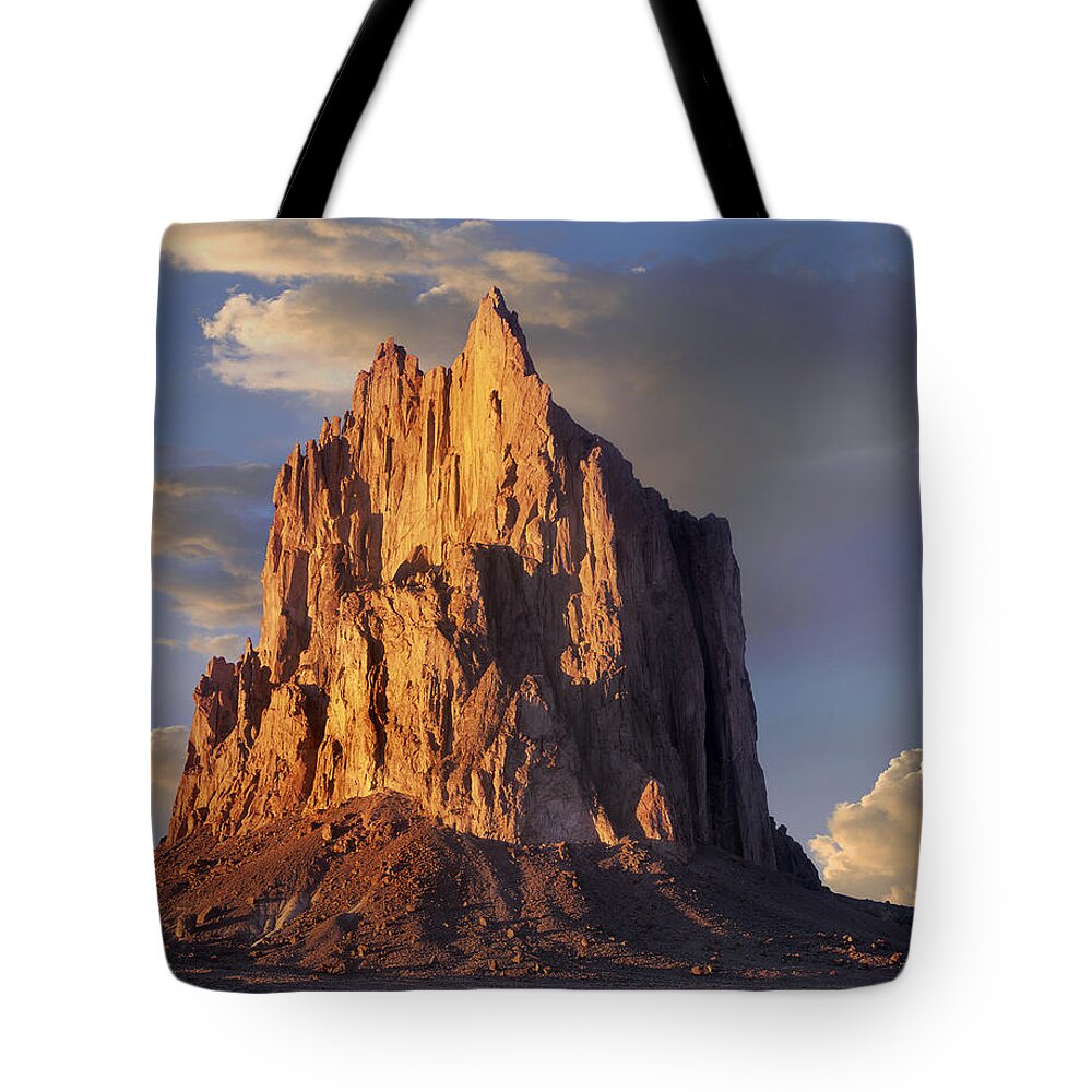 00177080 Tote Bag featuring the photograph Shiprock The Basalt Core Of An Extinct #4 by Tim Fitzharris