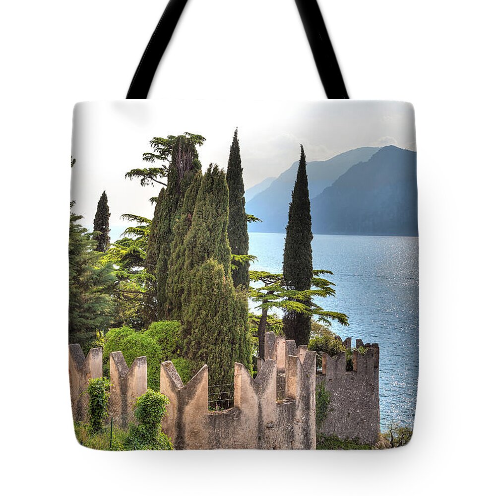Architecture Tote Bag featuring the photograph view over the Lake Garda with the charming village Malcesine #4 by Gina Koch