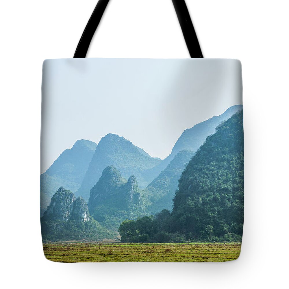 Countryside Tote Bag featuring the photograph Countryside scenery in the mist #5 by Carl Ning