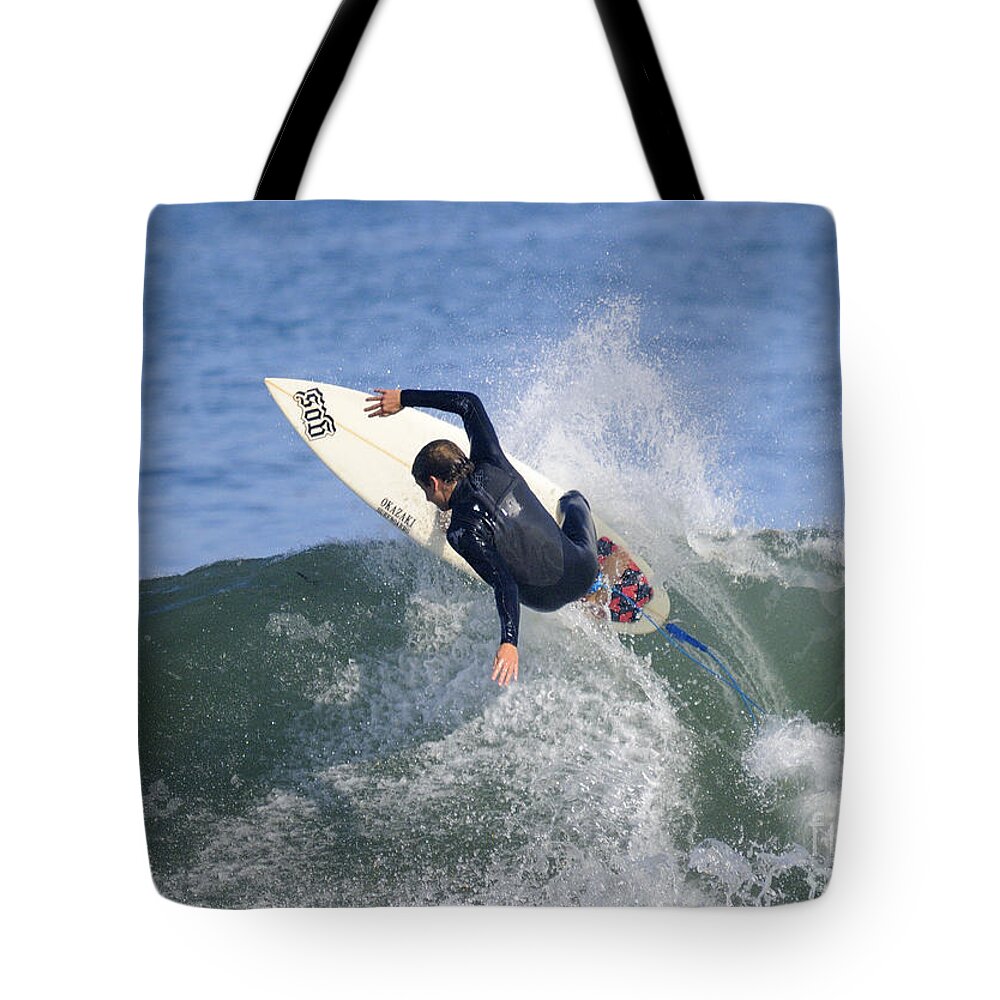 Surfer Tote Bag featuring the photograph Surfer #5 by Marc Bittan