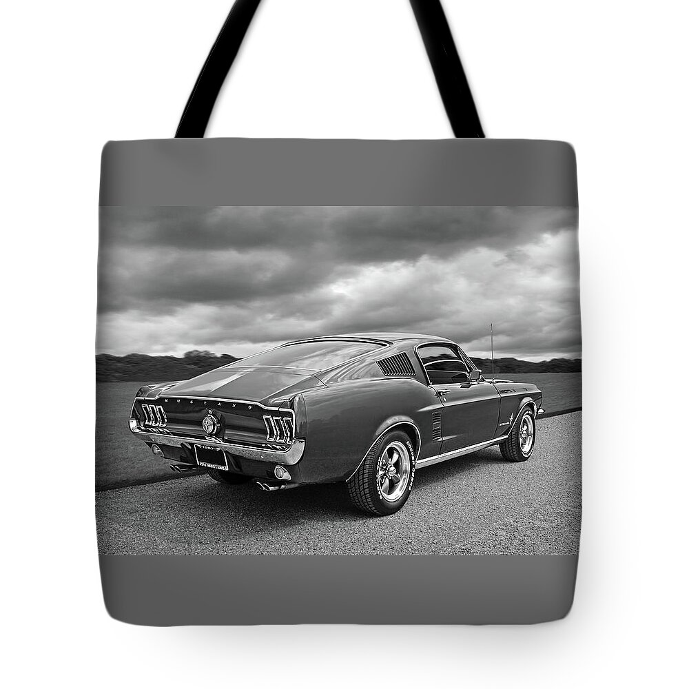 Ford Mustang Tote Bag featuring the photograph 67 Fastback Mustang in Black and White by Gill Billington