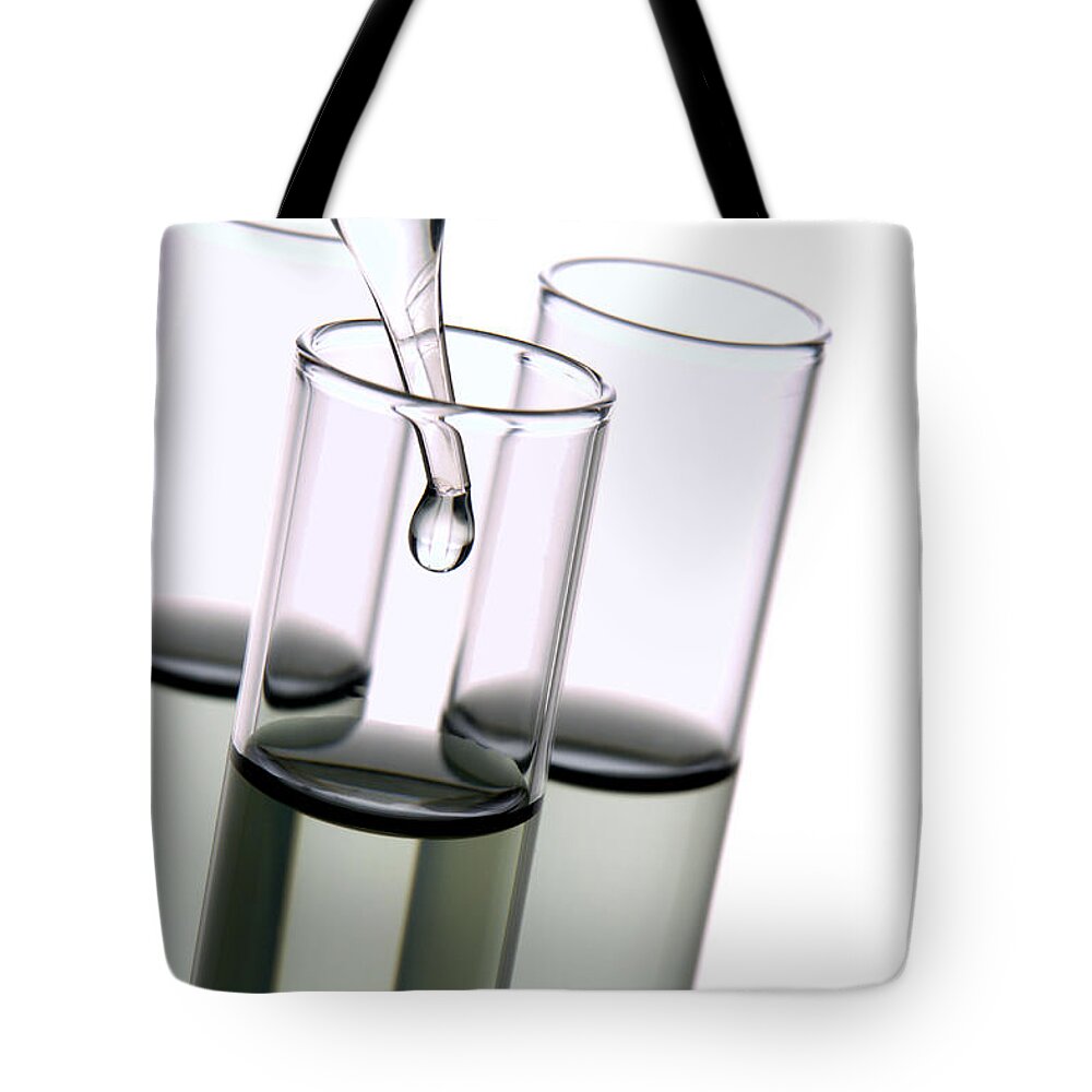 Chemistry Tote Bag featuring the photograph Test Tubes in Science Research Lab #68 by Olivier Le Queinec