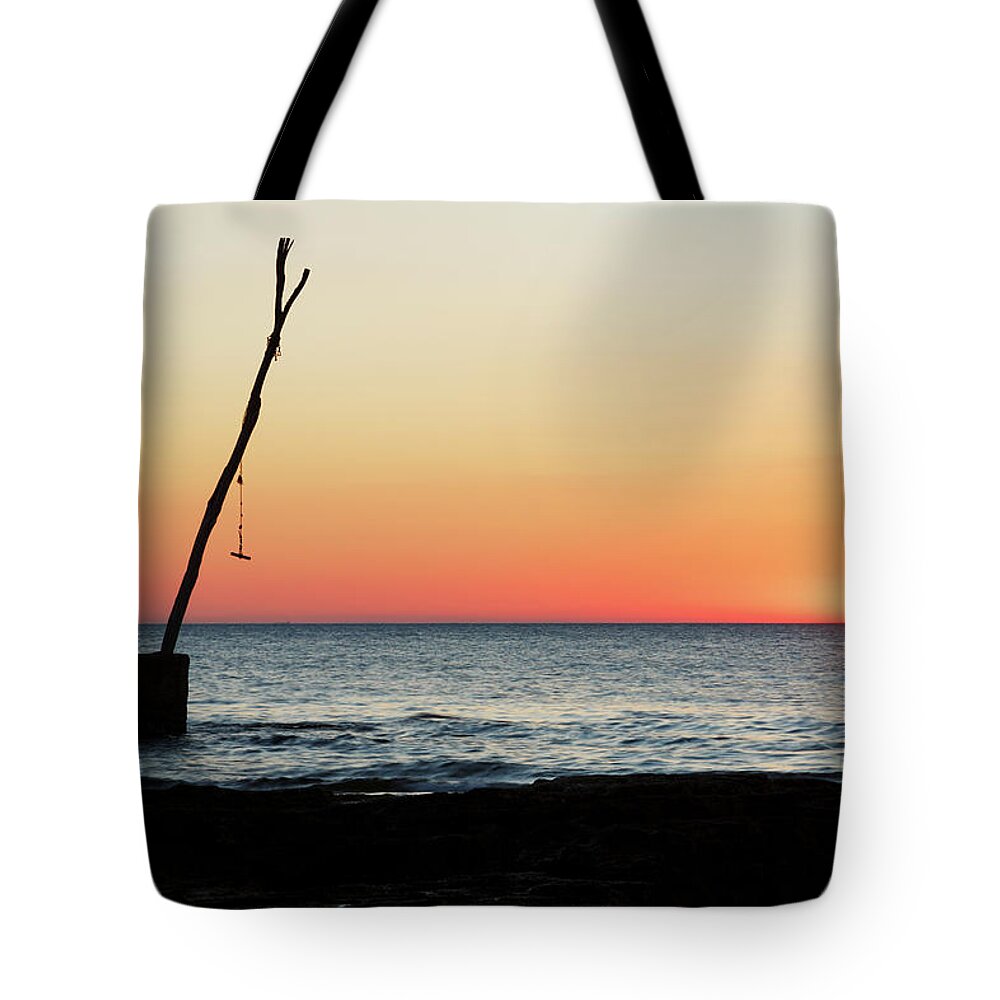 Ba�anija Tote Bag featuring the photograph Sunset at basanija by Ian Middleton