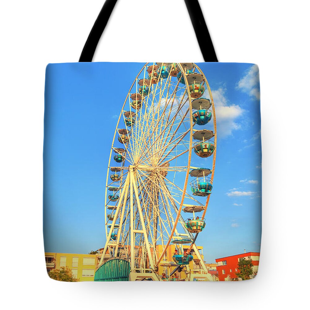 Action Tote Bag featuring the photograph A Big Ferris Wheel On A Carnival by Gina Koch