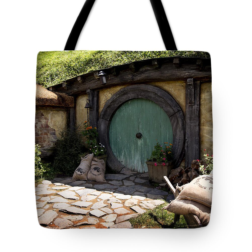 The Shire Tote Bag featuring the photograph A Colorful Hobbit Home by Kathryn McBride