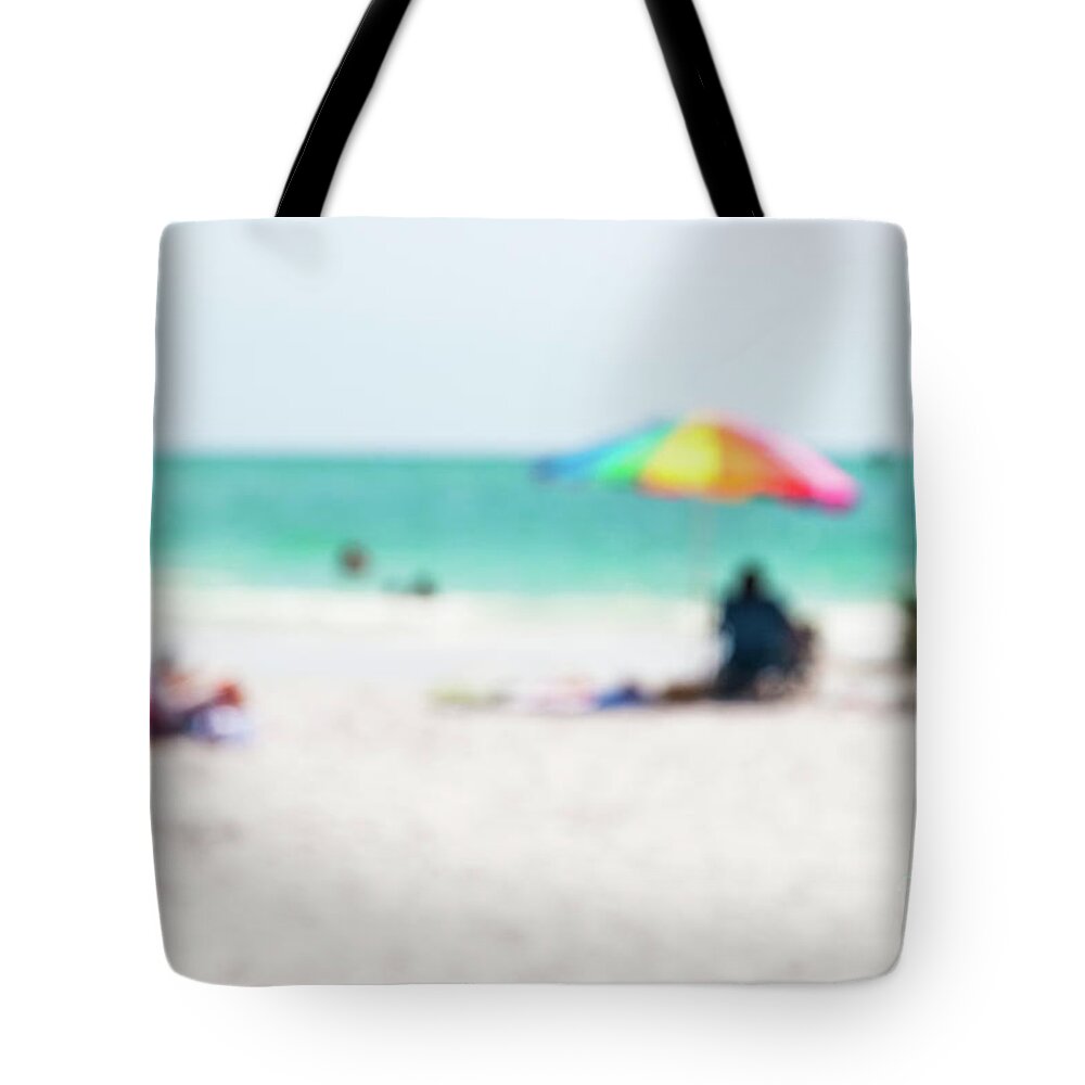 Atlantic Tote Bag featuring the photograph a day at the beach IV by Hannes Cmarits