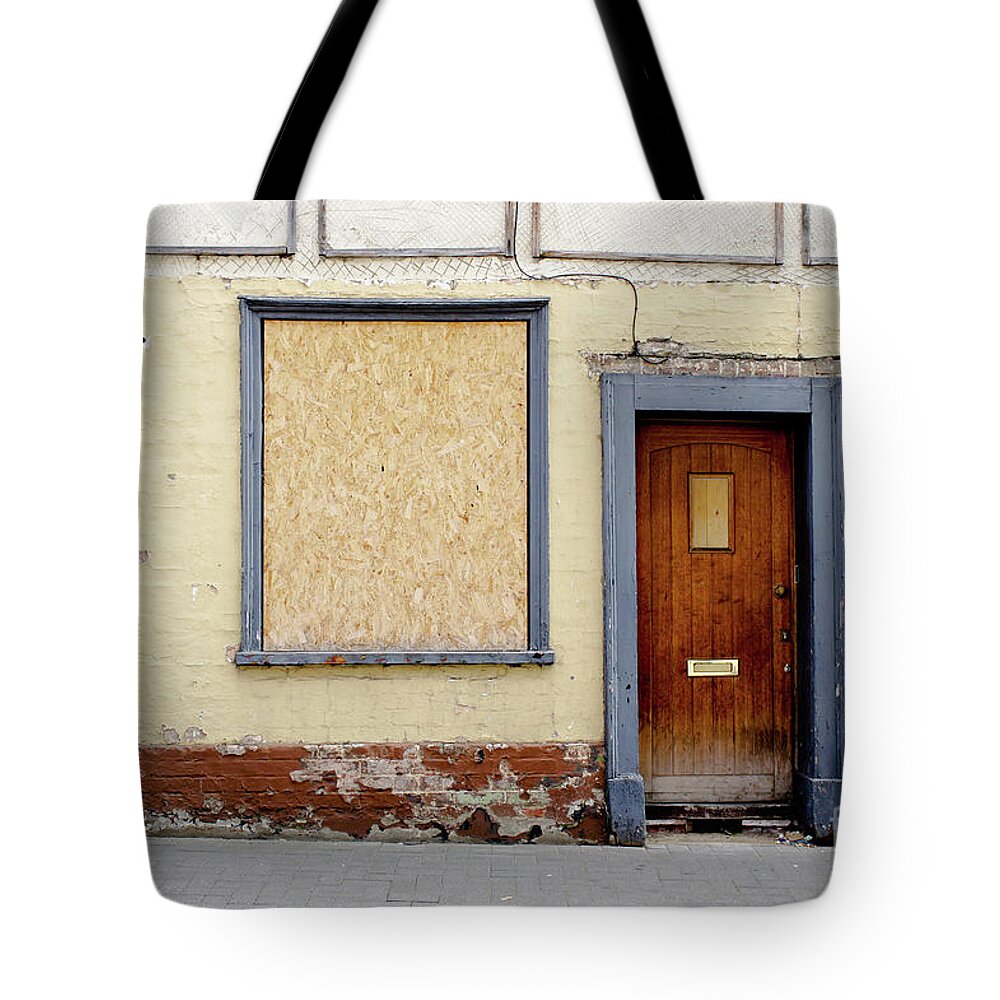 Abandoned Tote Bag featuring the photograph A derelict house by Tom Gowanlock
