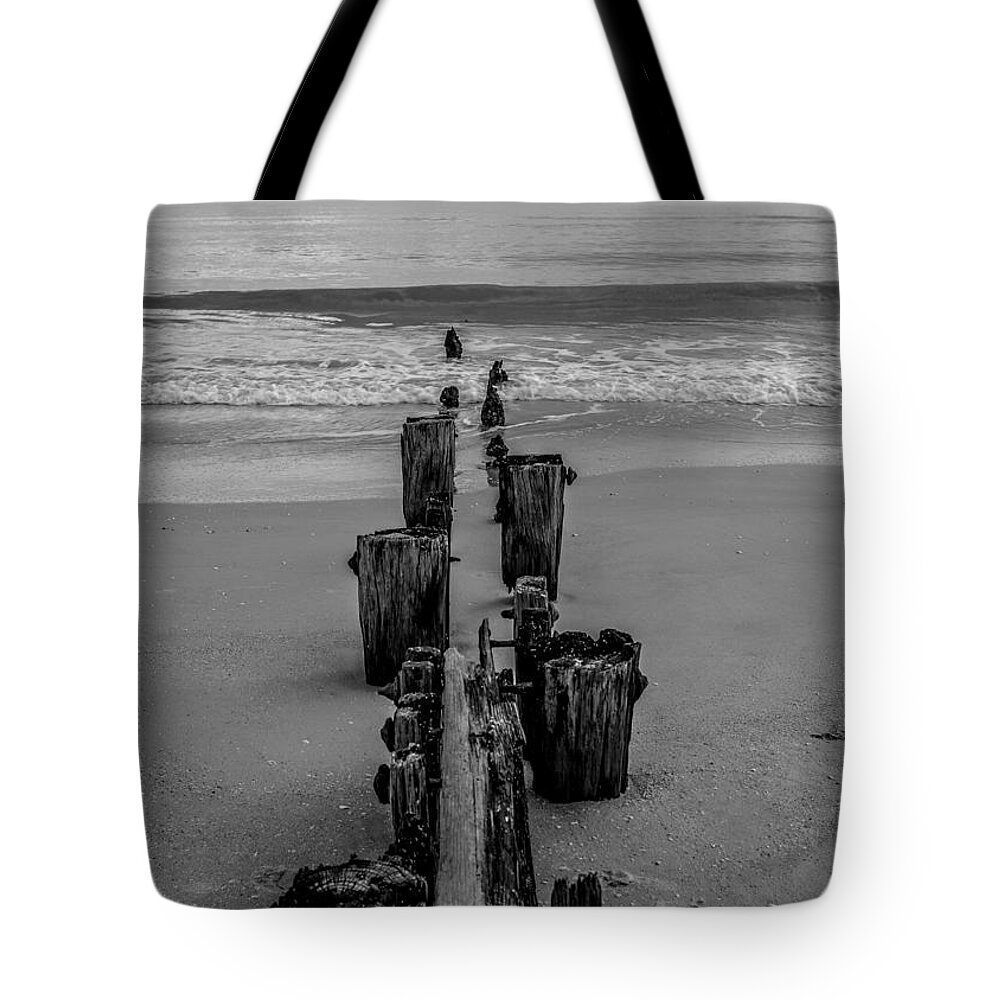 Fisherman Tote Bag featuring the photograph A Line in the Sand by Hermes Fine Art