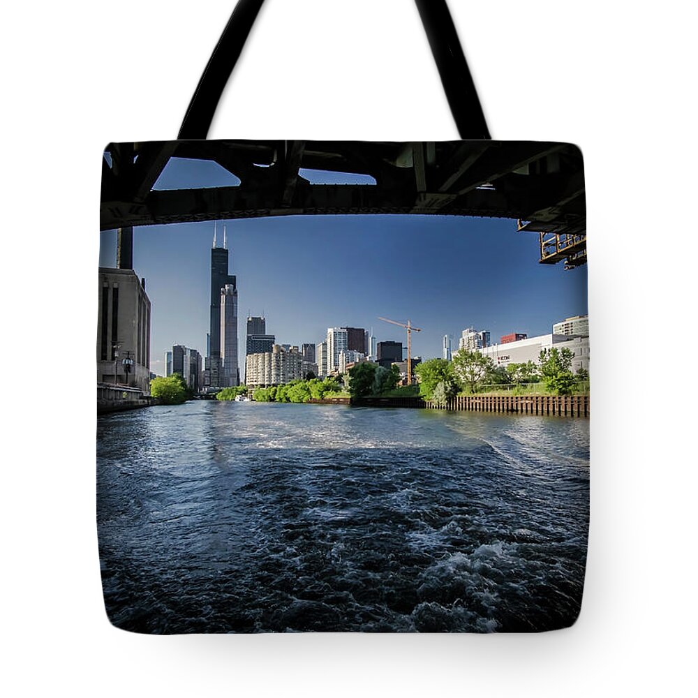 Roosevelt Road Bridge Tote Bag featuring the photograph A look at The Chicago Skyline from under the roosevelt road bridge by Sven Brogren