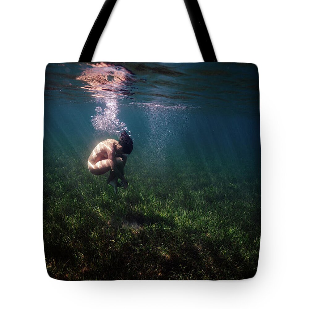 Mermaid Tote Bag featuring the photograph A Mermaid in a Sea of Coral by Gemma Silvestre