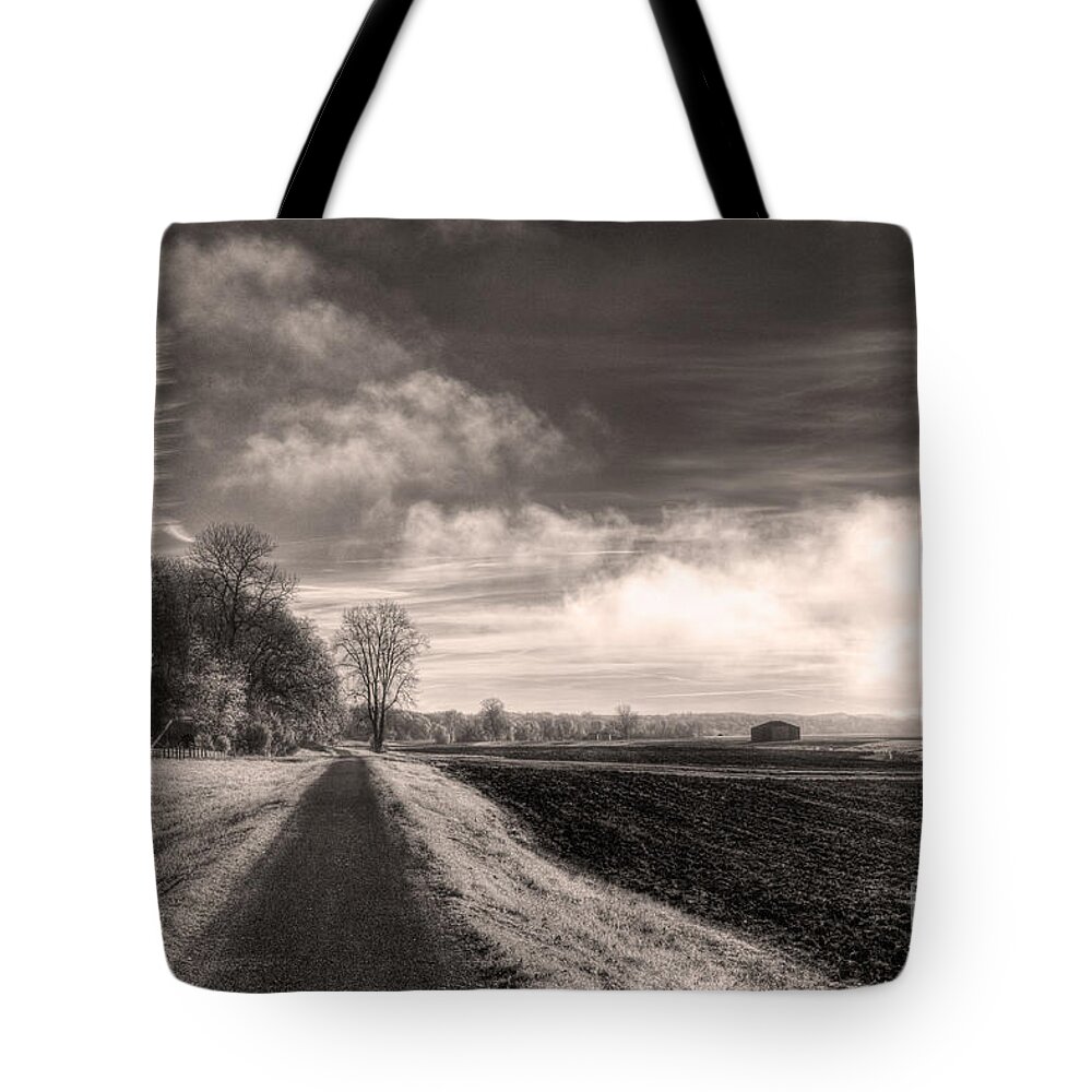 A Mist Over The Missouri Bottoms Tote Bag featuring the photograph A Mist Over the Missouri Bottoms by William Fields