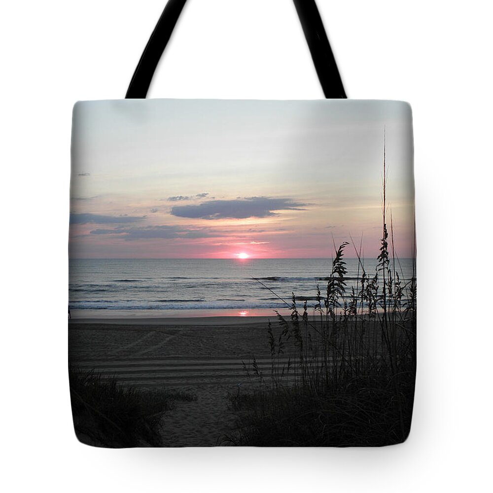Sunrise Tote Bag featuring the photograph A Morning Stroll At Sunrise by Kim Galluzzo