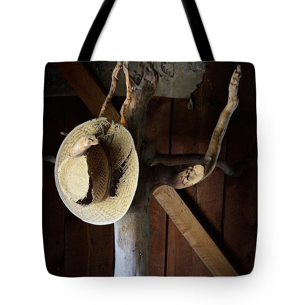 Hat Rack Western West Rodeo Ghost Town Hall Tree Old Straw Tree Stand Tote Bag featuring the photograph A Place to Hang Your Hat 5448 by Ken DePue