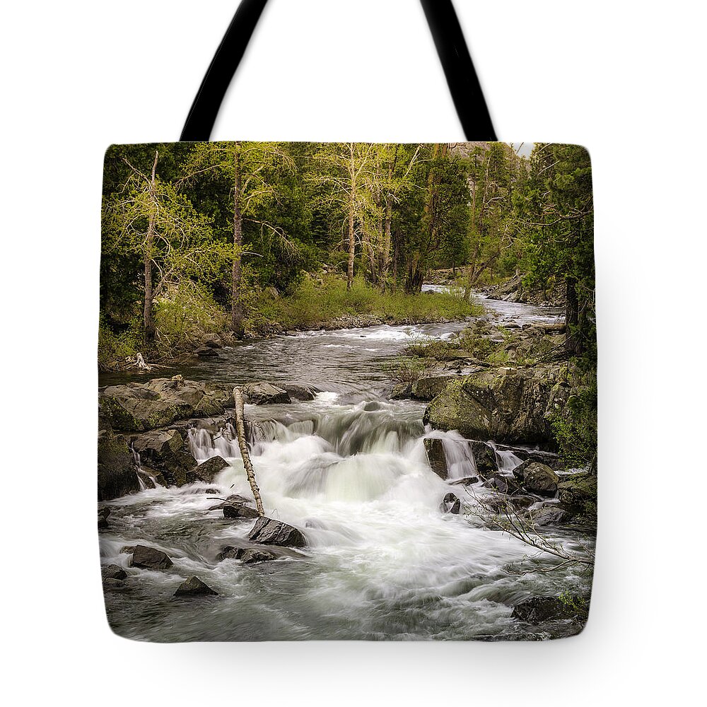 River Tote Bag featuring the photograph A River Flows by Janet Kopper
