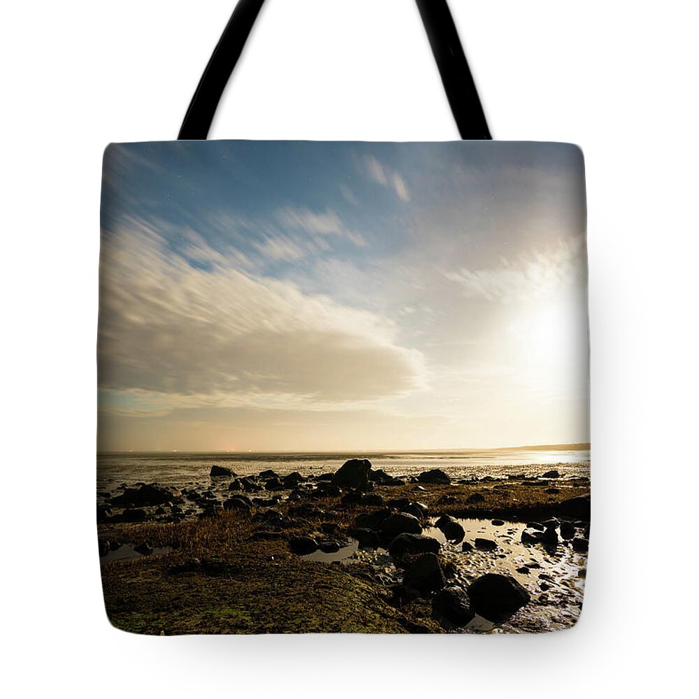 Sunset Tote Bag featuring the photograph A Rocky Day by Jose Cruz
