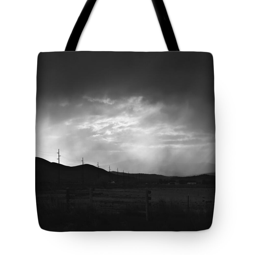 Clouds Tote Bag featuring the photograph A Silver lining by Tory Stephens