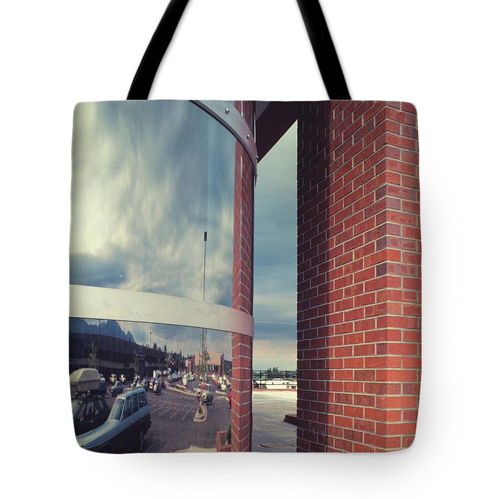 Photography Tote Bag featuring the photograph A Slit In The Brick Wall by Marc Nader