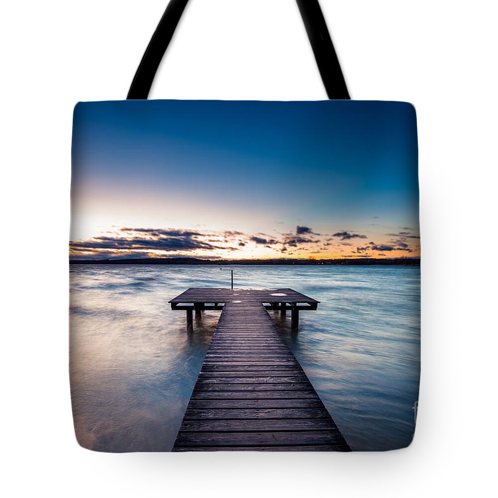 Ammersee Tote Bag featuring the photograph A Stormy Day Ends by Hannes Cmarits
