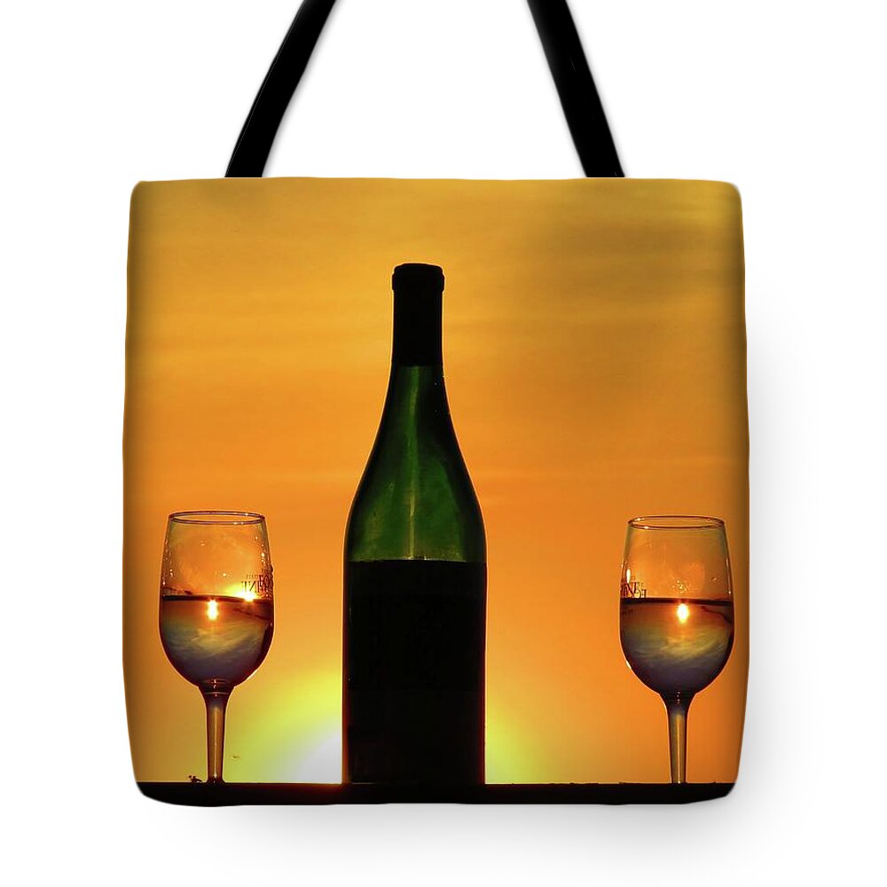 Thousand Islands Tote Bag featuring the photograph A sunset in each glass by Dennis McCarthy