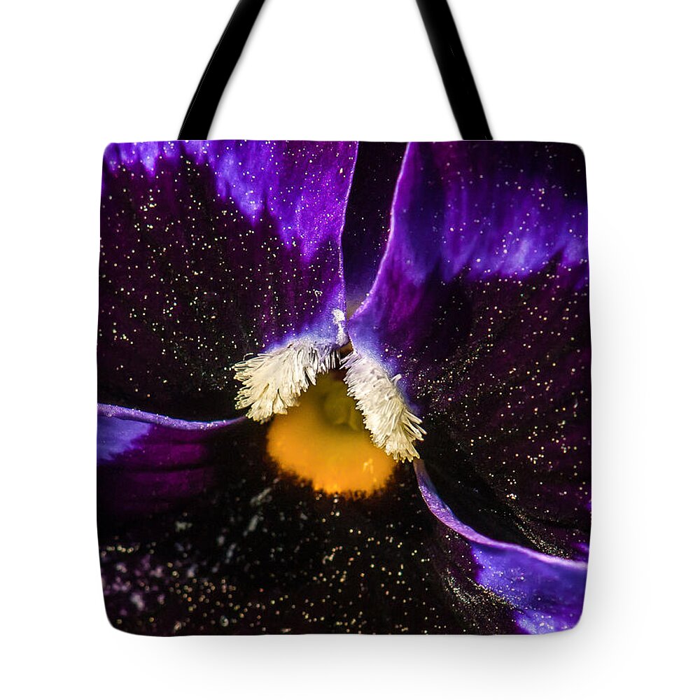 Pansy Tote Bag featuring the photograph A Universe in a Pansy by Jim Moore