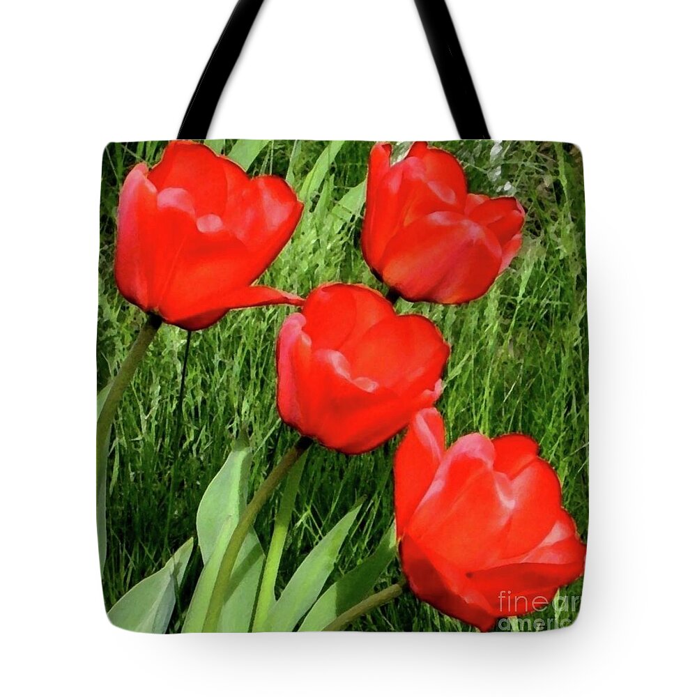 Four Red Tulips Tote Bag featuring the photograph A Welcome Surprise by Hazel Holland