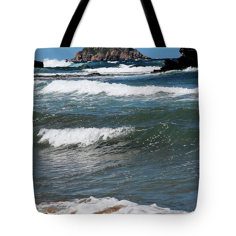 Outboor Tote Bag featuring the photograph A windy day in the beach by Pedro Cardona Llambias