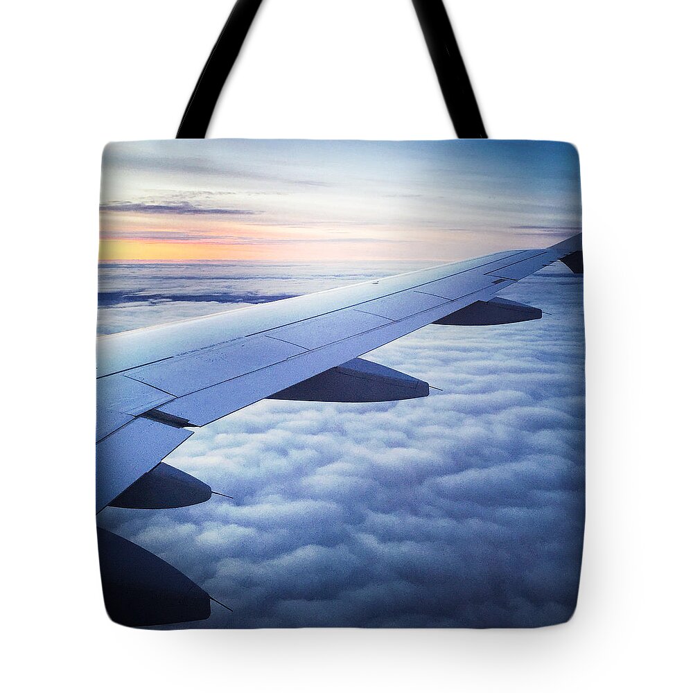 Plane Tote Bag featuring the photograph Above the clouds 01 by Matthias Hauser