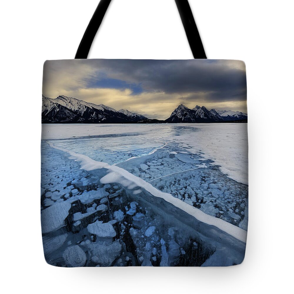 Abraham Lake Tote Bag featuring the photograph Abraham Lake Ice Bubbles by Dan Jurak