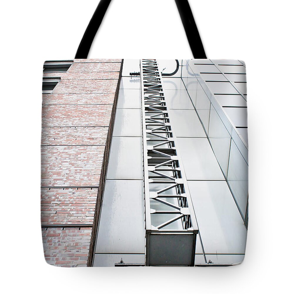 Access Tote Bag featuring the photograph Access ladder by Tom Gowanlock