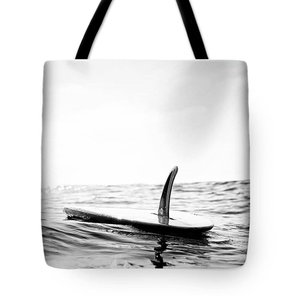 Surfing Tote Bag featuring the photograph Afloat by Nik West