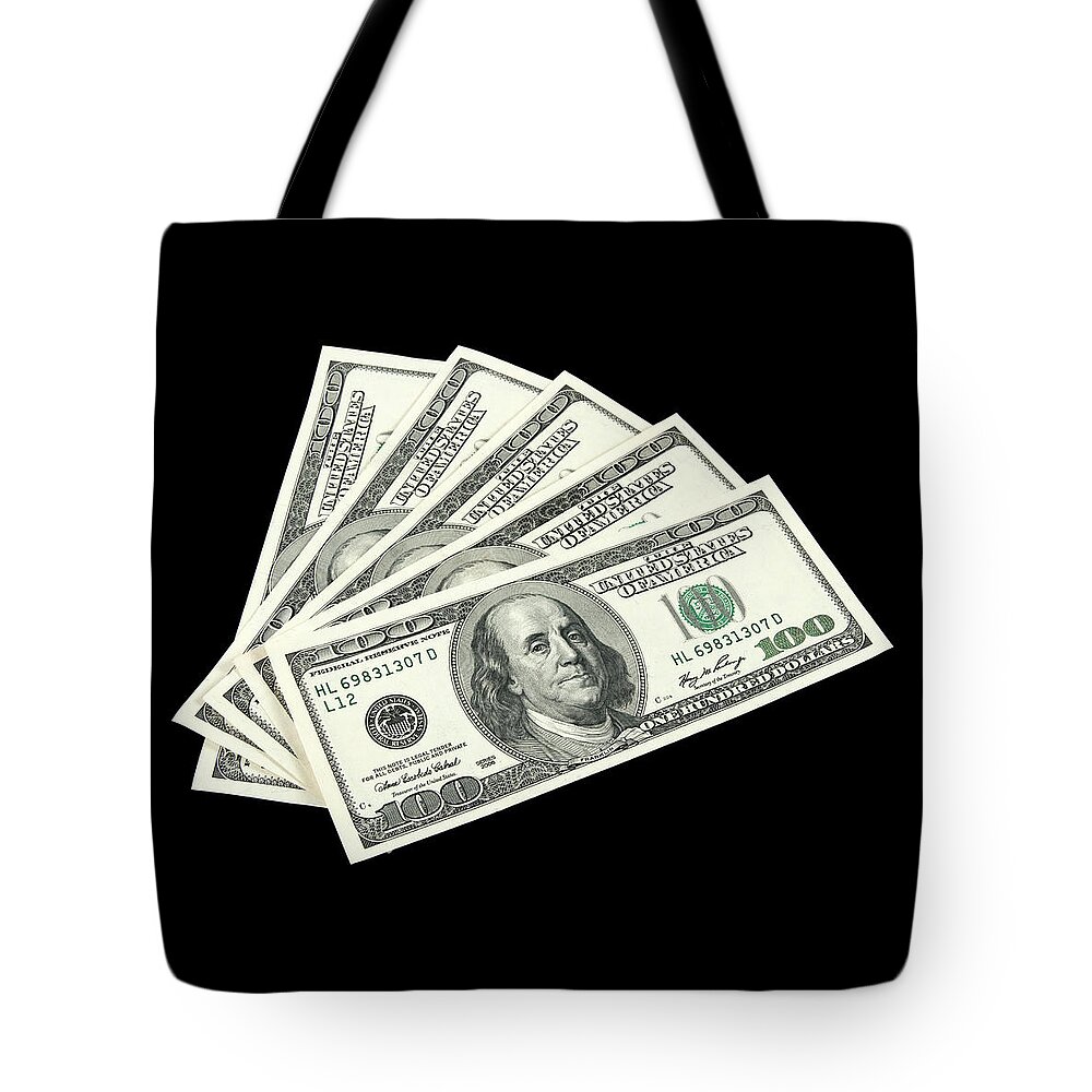 Money Tote Bag featuring the photograph American money on black background by GoodMood Art