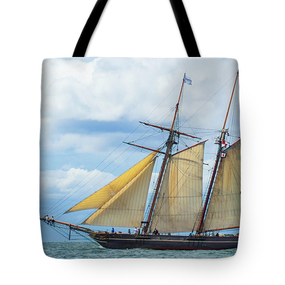 Amistad Tote Bag featuring the photograph Amistad Under Sail by Joe Geraci