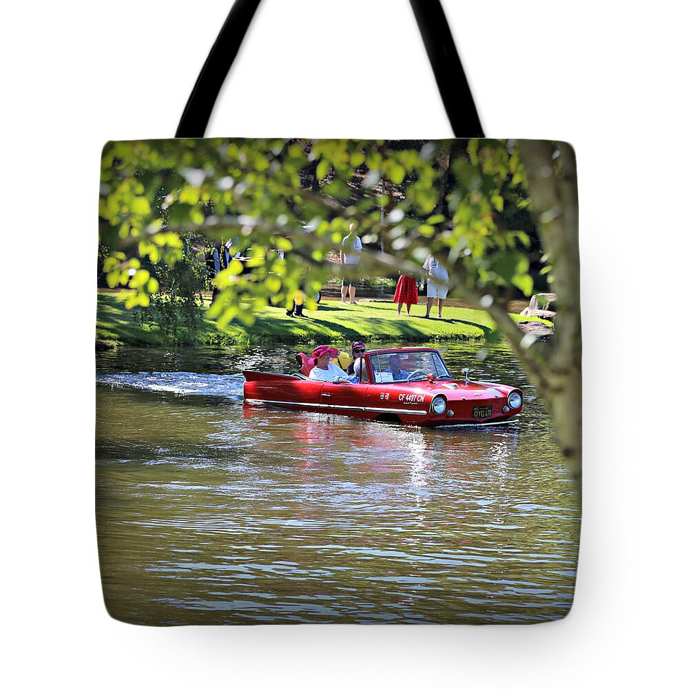 Amphicar Tote Bag featuring the photograph Amphicar Swimming by Steve Natale